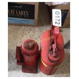 Bottle jack, gas can