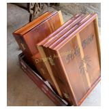 Three wooden cased Bibles