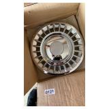 4 hubcaps and string