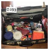 Brief case with tape, pencils, sccicors and more