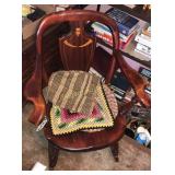 Wooden rocking chair with knittings