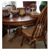 Oak perdestal table with leaf and 4 chairs