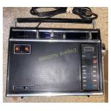 Radio, clock, paper scroll