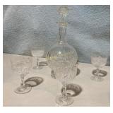 Clear glass decanter with glasses