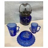 Blue Shirley Temple dishes , blue glass urn