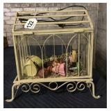 Metal decorative cage with Knick knacks