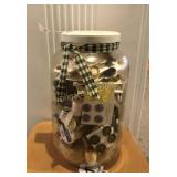 Glass jar with sewing materials
