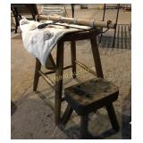 Quilt hanging and (2) wooden stools