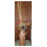 Umbrella stand with artificial flowers