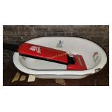 Enameled tub and toy vacuum