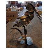 Metal bird sculpture