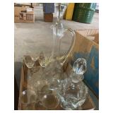 Clear glass decanters and glasses