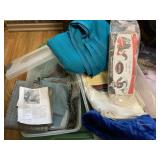 (3) plastic containers of fabric, linens and more