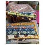 (2) containers of fabric, quilt pieces