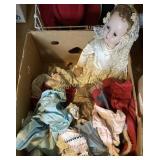 Box of doll clothes and doll