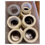 Boxes of packing tape and dispenser