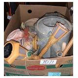 Outdoor light, metal tin watering can, sea shells