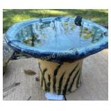 Concrete mushroom birdbath