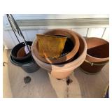 Clay planters with plastic planting pots