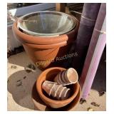 Clay pots, large plastic pots and printers roll