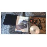 Bluetooth keyboard case, Netgaear modem, cds, more