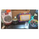 Sketch pad, Bright Start, cds, shower head, more
