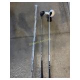 (2) golf clubs and curtain rod