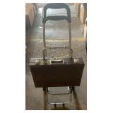 Luggage carrier, briefcase, and casset tapes