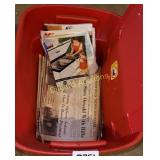 Tote with old newspapers and more