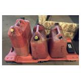 Fuel cans and creeper