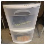 Plastic drawers with misc electronic cords and