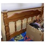 Wooden twin bed (contents NOT included)