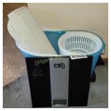 Scale, mopping bucket and mat
