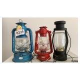 Two kerosene lanterns and one electric lantern