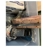 Tote with skillets, grater, knife, electric burner