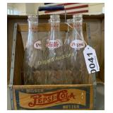 Pepsi-Cola glass bottles and wooden carrier