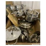 Assorted pots and pans, tea kettle, cutting boards