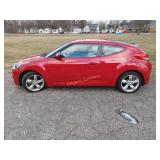 2013 Hyundai Veloster  (23,682 miles)