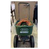 Scott's seed spreader and extension cord