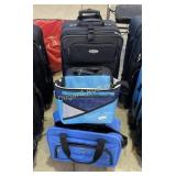 (3) luggage bags and a lunch box