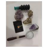 Rocks, squirrel call, wallet, mag glass