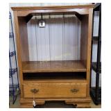 Oak rolling TV console (38'W x 53'H x 22'D)
