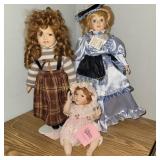 (8) porcelain dolls