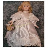 Porcelain doll and doll furniture