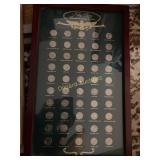 50 US state Quarter collection in frame