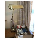Calculators, tape, office table light, and more
