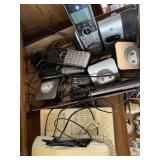 Landline phones and glass pitcher