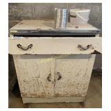 Metal cabinet with contents