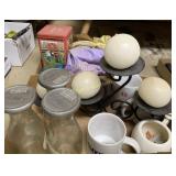 Coffee cups, glass jars, candle holder and more