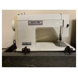 White portable sewing machine